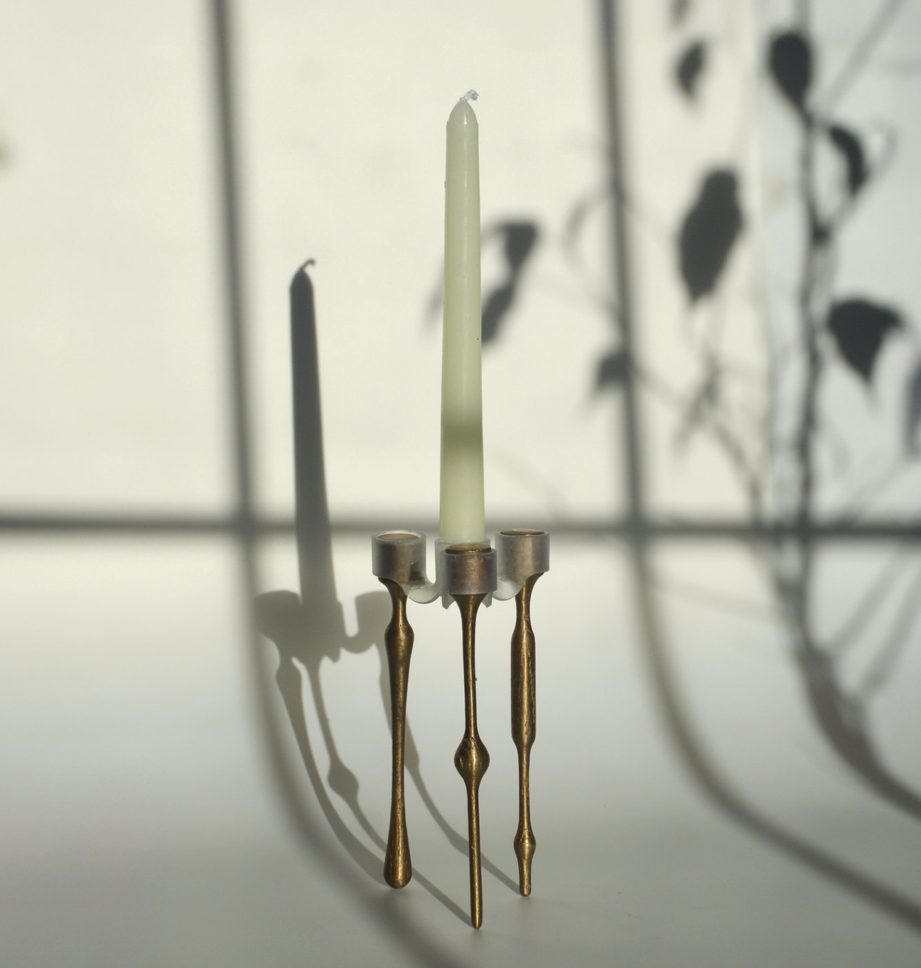 Bronze and resin candle stick holder